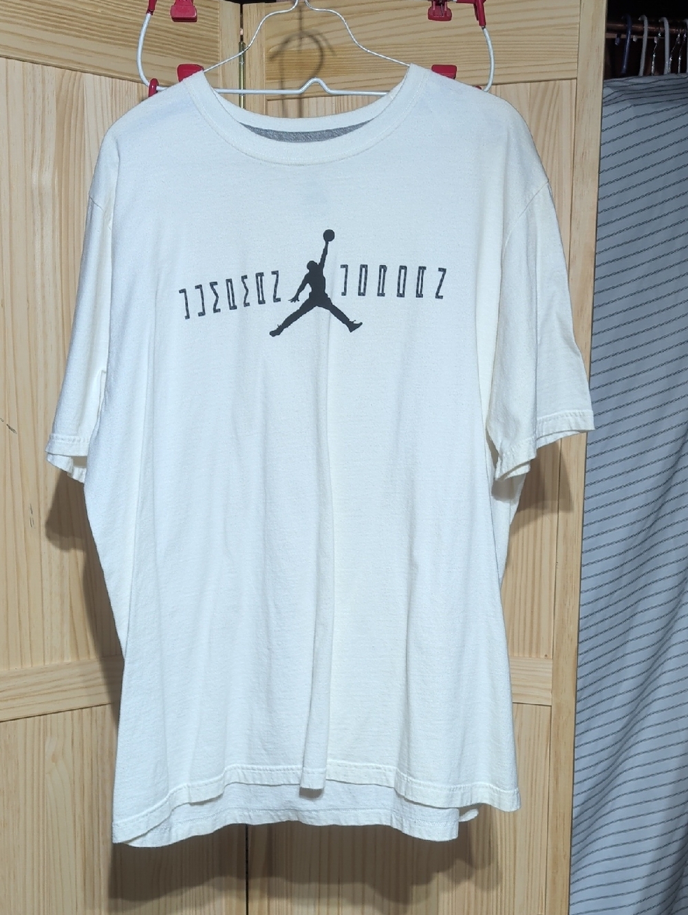 Jordan White Short Sleeve Tee with Black Jumpman Graphic